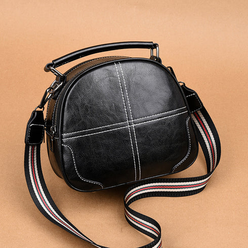 Stitching handbags leather texture with shoulder strap